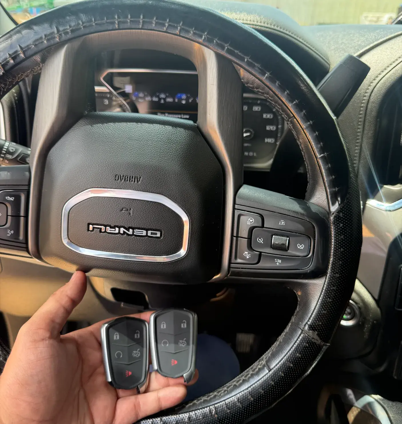 4Keys Locksmith technician programming GMC car keys on-site in Metro Atlanta